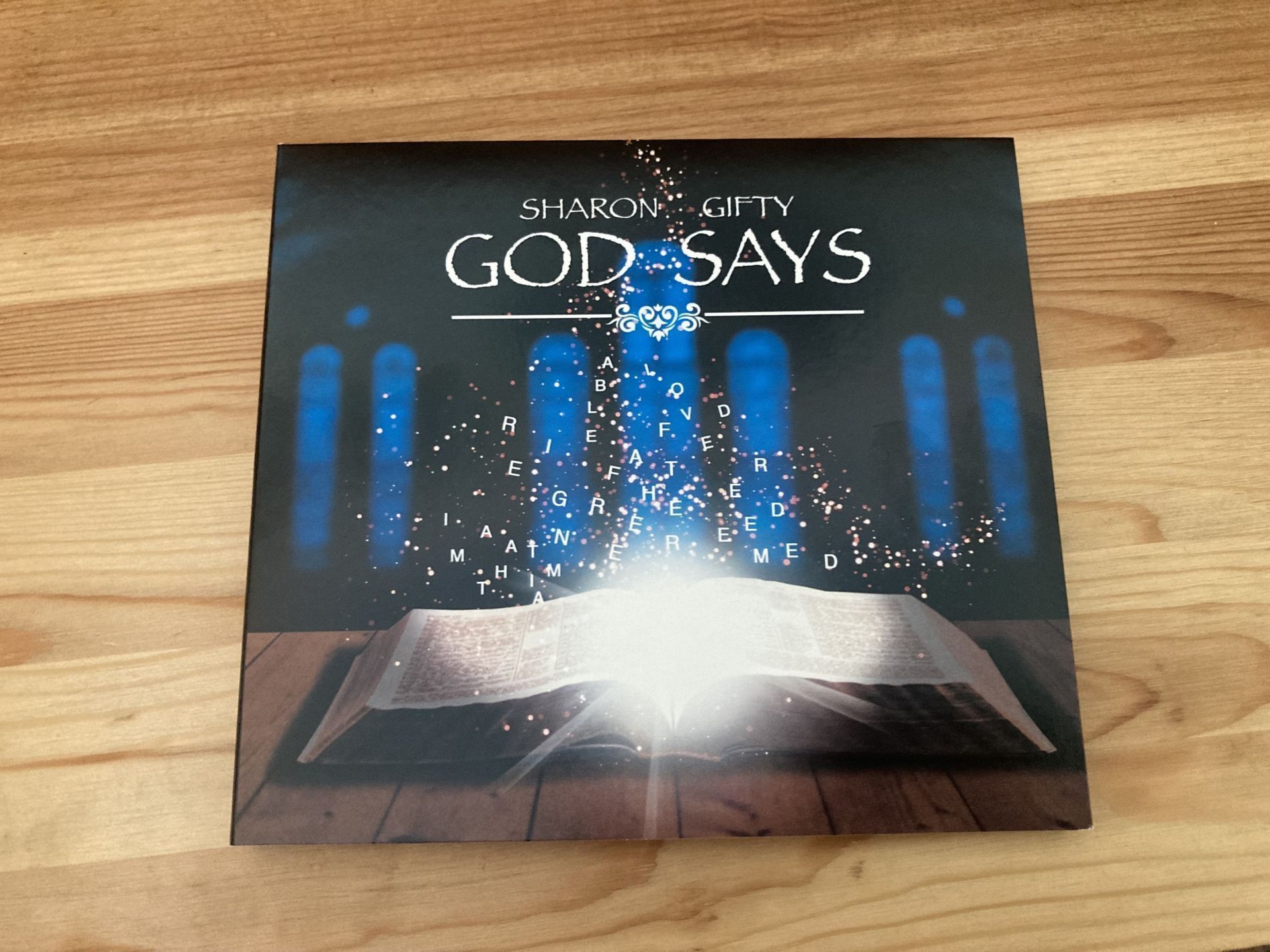 'God Says' Signed Album